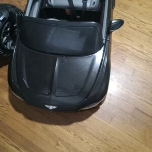 Black Kids Ride-On Sports Car with Steering Wheel